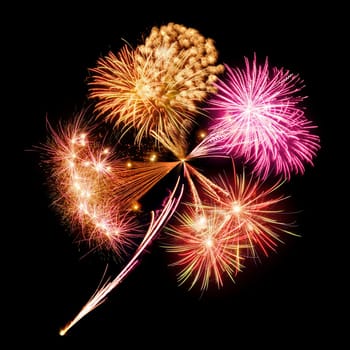 Concept image of fireworks in the form of a shamrock on a black background