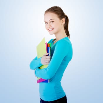 happy student girl with notebooks