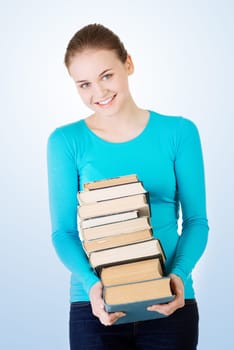 young caucasian woman (student) with books