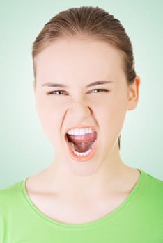 young casual woman screaming with anger