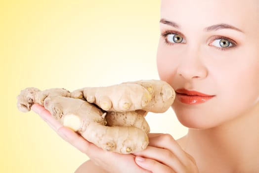 beautiful woman with fresh ginger