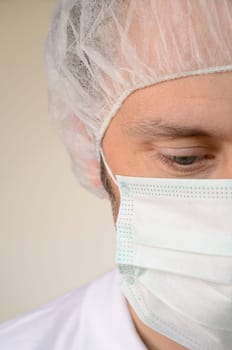 Mature male looking down at hospital,close up shot