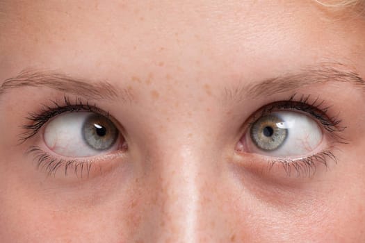 Close-up of a woman's squinting beautiful eyes