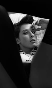 Portrait through the legs of a beautiful woman