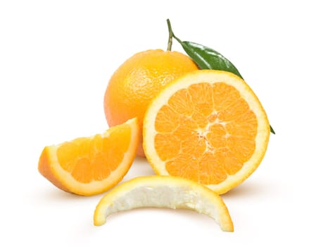 Ripe citrus with a green leaf on a white background