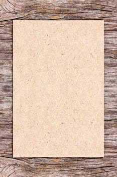 Recycle paper on wooden background. Can be used for your text