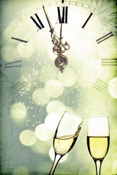 Vintage photo of glasses with champagne against holiday lights and clock close to midnight