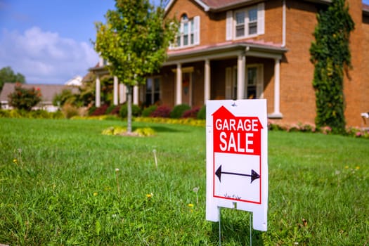 Closeup image of a garage sale sign