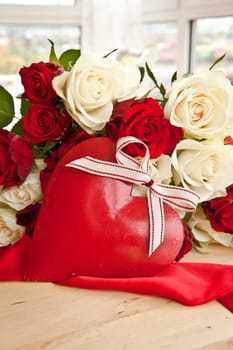 White and red roses with a big red heart