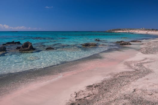 Beaches in Elafonisi, Crete island. have the particularity to be colored pink because of the coral fragments accumulated on the shore