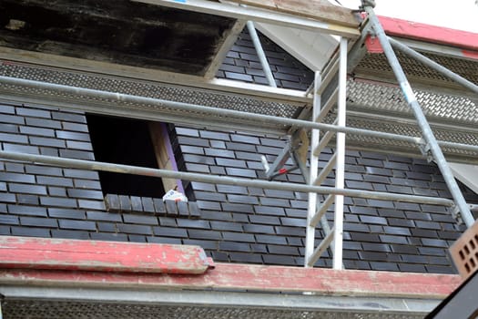Scaffolding for a new facing masonry