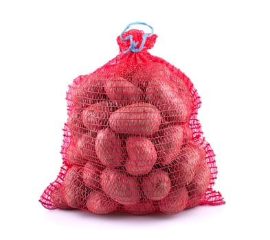 Sack of potatoes isolated on white background.