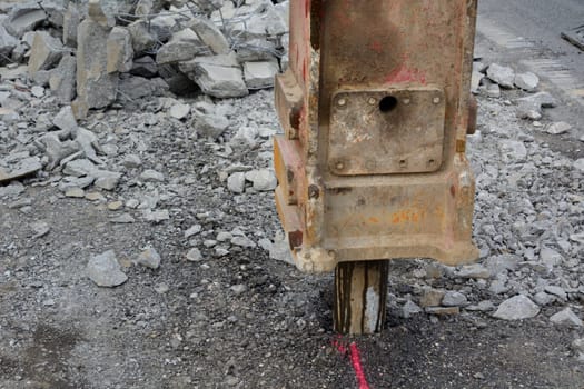 Road demolition during civil engineering measures