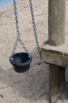 Playground equipment on a sand surface