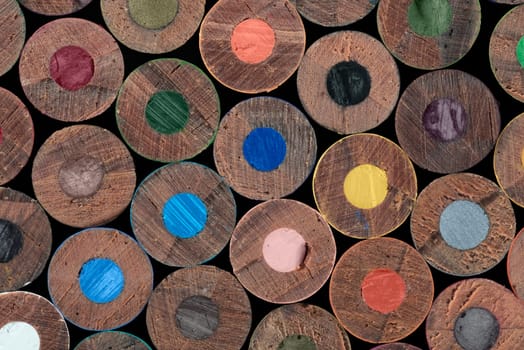 Several pencil next to one another forming a textured background.