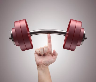 Weight lifting with just one finger. Concept of strength and training.