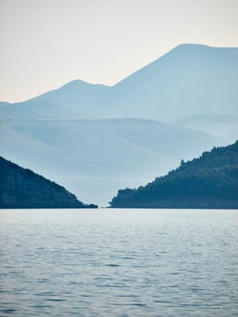 Coast berween two islands, in morning mist