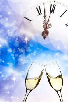 Glasses with champagne against holiday light and snowflakes