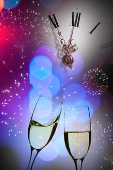 Glasses with champagne against fireworks and clock close to midnight