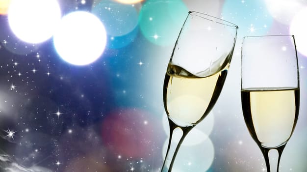 Glasses with champagne against fireworks and clock close to midnight