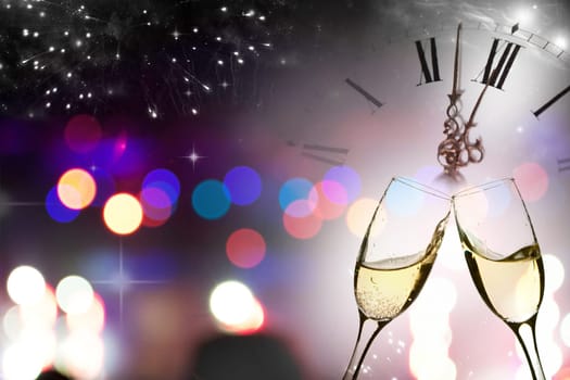 Glasses with champagne against fireworks and clock close to midnight