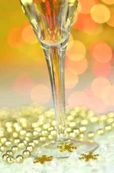 a glass of champagne against bokeh background