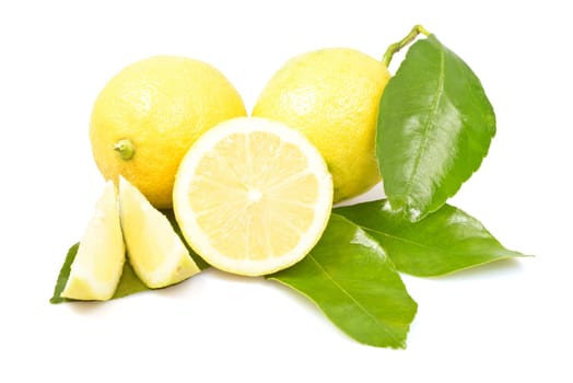 ripe orange cut in slices on a white background