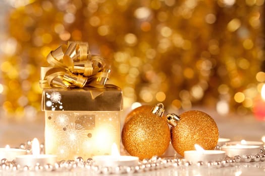 Christmas decoration with Gift box, candles and balls