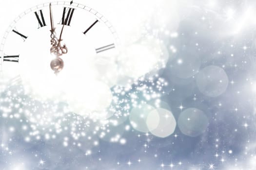 New Year's at midnight - Old clock with stars snowflakes and holiday lights