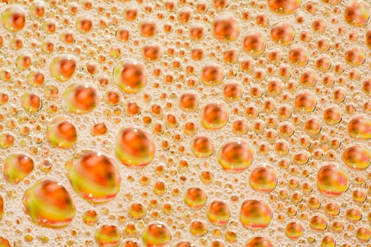 Abstract macro image of soap, oil and water mixture