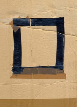 Grunge adhesive tape border frame cardboard paper background. Design element.