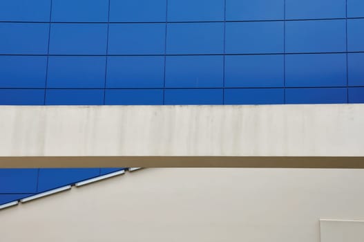 Glass building facade detail abstract architecture background.