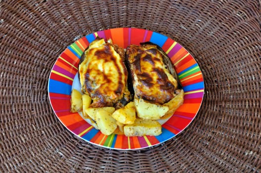 Eggplants stuffed with ground beef and bechamel white sauce. Greek food papoutsakia.