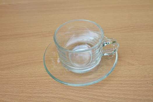 coffee cup on wood table background