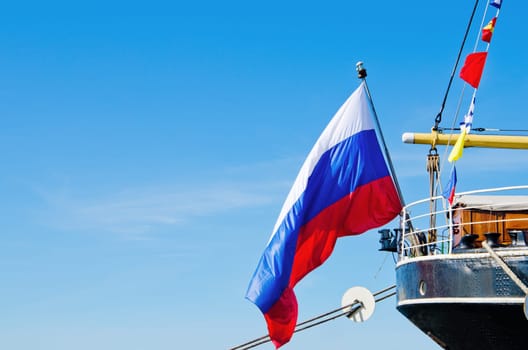 Russian flag flies at the stern old sailboat