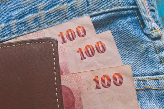Banknote in a jeans pocket, close up texture
