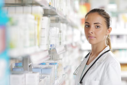 Environmental Portrait of a medical personnel, or doctor in pharmacy