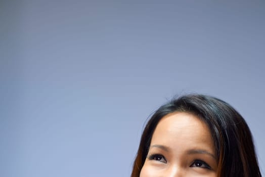 Young people and body care with portrait of happy asian girl smiling in studio on gray background, cropped face and copy space