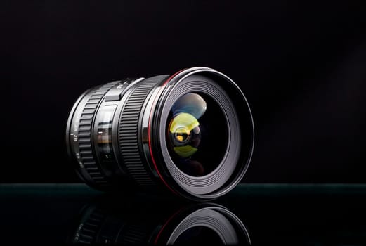 Wide camera lens isolated on black