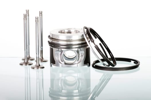 Piston and accesories  isolated on white
