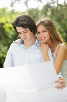 a young married couple examines the design of its new home