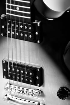 Black and white photo of electric guitar