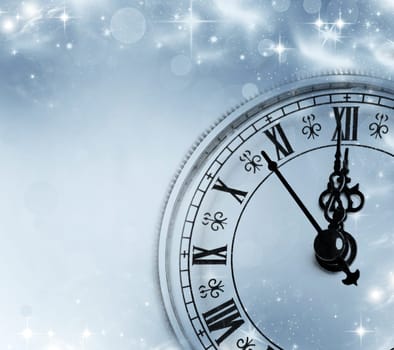 Old clock against holiday lights