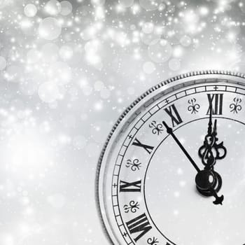 Old clock against holiday lights