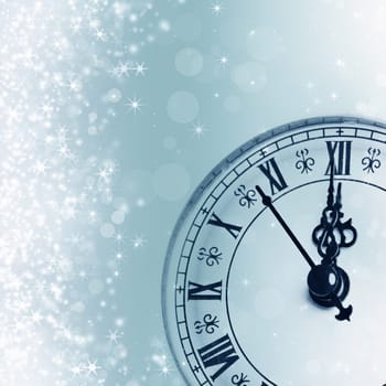 Old clock against holiday lights