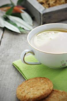 Cup of tea on wood board, drink for health