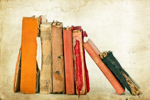 Old books on vintage background