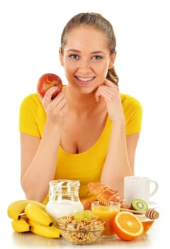 Young woman having breakfast. Balanced diet