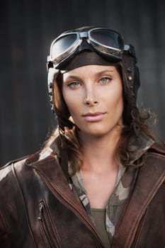 Portrait of young woman aviator