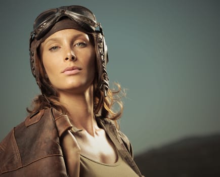 Portrait of young woman airplane pilot
